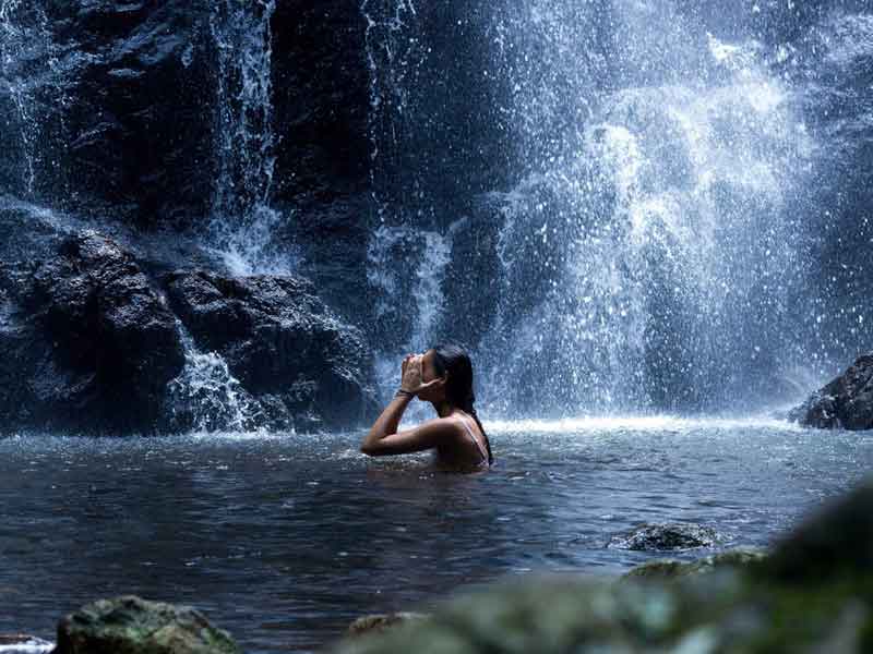 Natural waterfall swimming experience